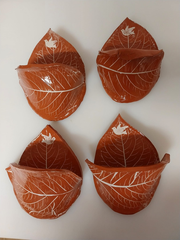 Unikati Nati, Nataša Pezdir, lončarstvo, glineni izdelki, umetniško ustvarjanje, delo z glino, glina